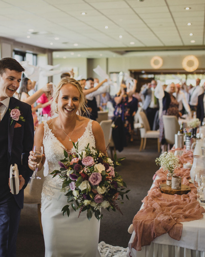 Couple Exchanging Vows at Comis Hotel & Golf Resort Isle of Man